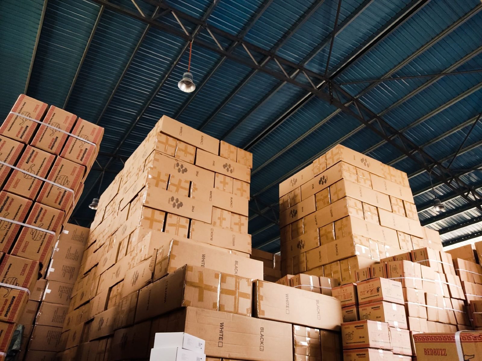 Cartons stacked on pallets in a warehouse