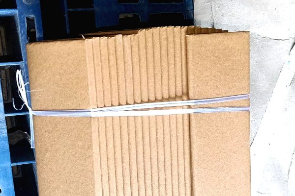 Warehouse floor with palletised rolls ready for strapping and despatch